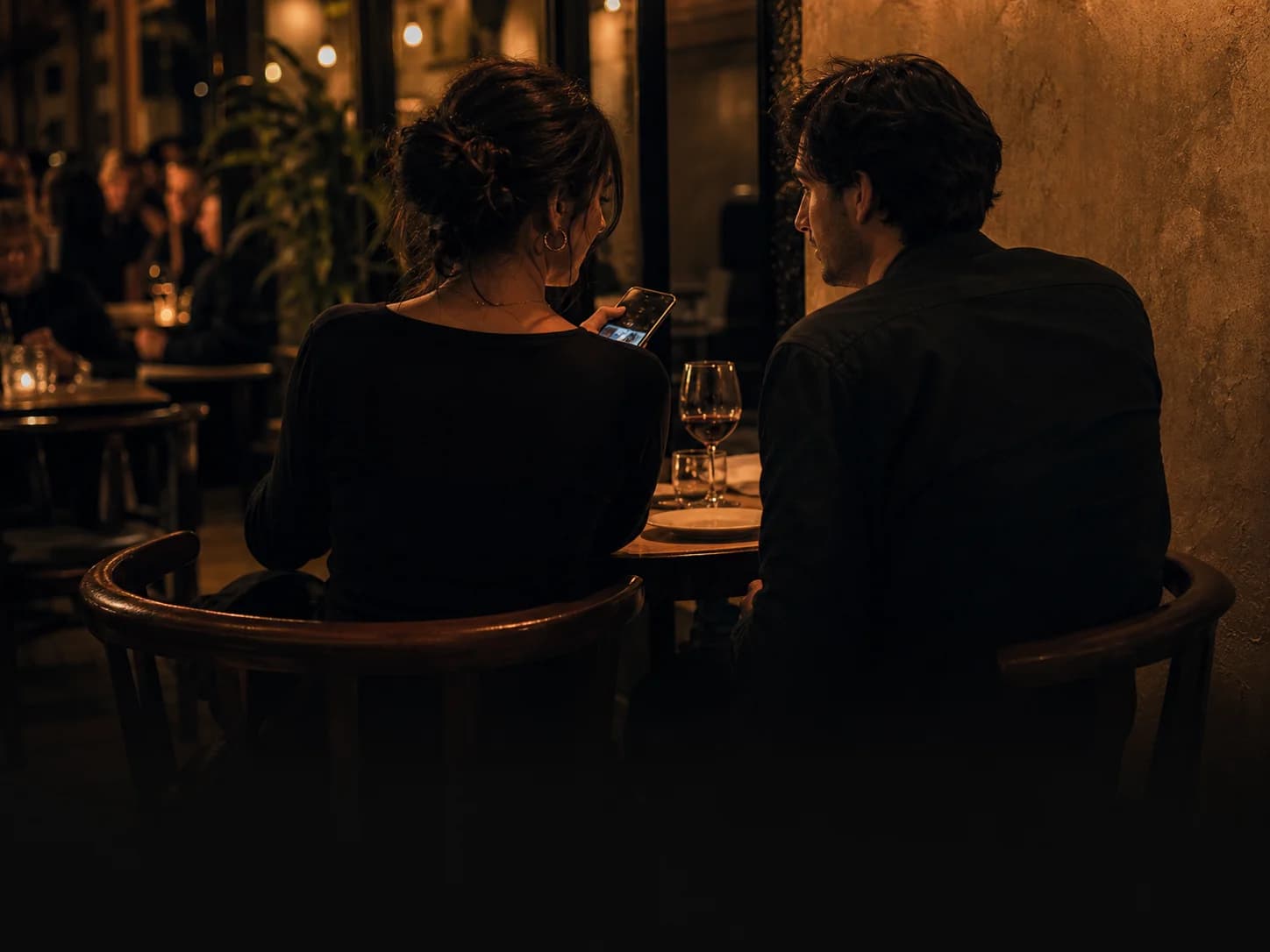 A couple choosing a place together over dinner