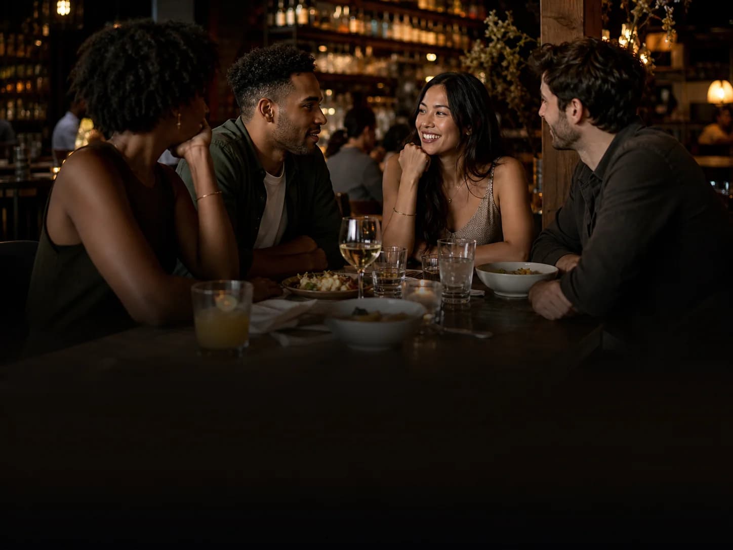 Friends sharing ideas around a table